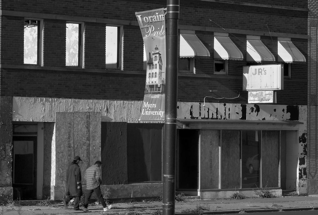 Second Place, James R. Gordon Ohio Understanding Award - Mike Levy / The Plain DealerA photograph of Lorain's Broadway Ave offers contrasting views.