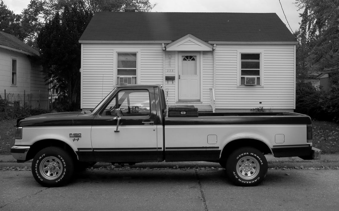 Second Place, James R. Gordon Ohio Understanding Award - Mike Levy / The Plain DealerA ford truck larger than the house behind it is a usual scene in Lorain. 