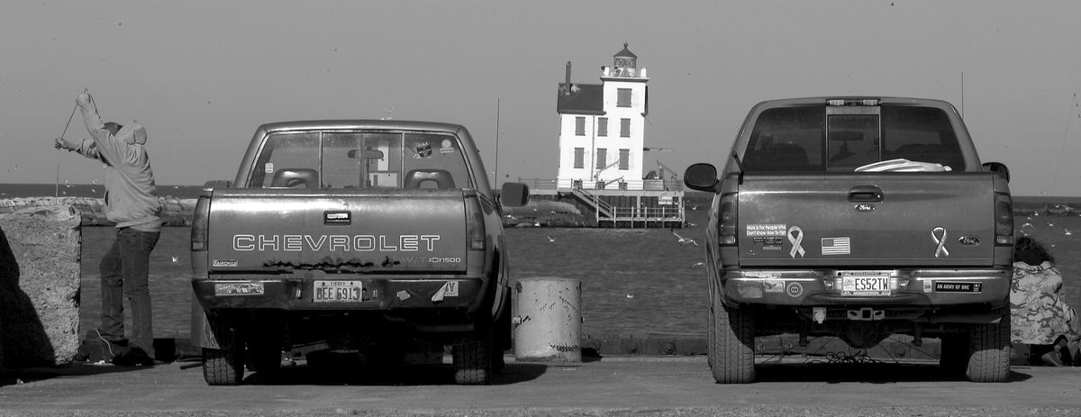 Second Place, James R. Gordon Ohio Understanding Award - Mike Levy / The Plain DealerIconic images of Lorain including pickup trucks, firsherman, lighthouse and Lake Erie. Ford's Lorain assembly plant plans to close doors for good by middle December 200 which will surely affect Lorain's economy. 