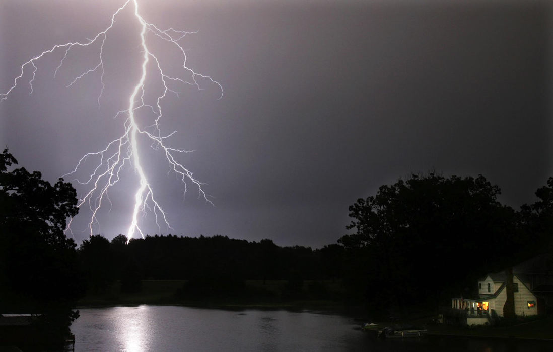 Award of Excellence, Pictorial - Ken Love / Akron Beacon JournalLightning strikes the Portage Lakes area during  a summer thunderstorm in Akron.