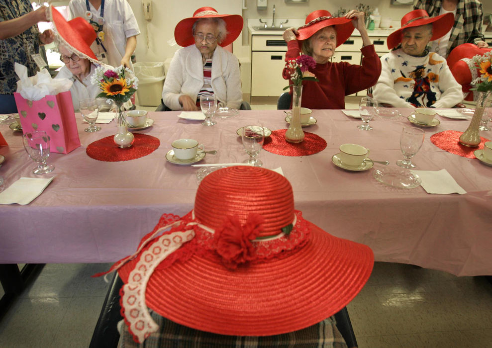 Award of Excellence, George S. Smallsreed Photographer of the Year Award - Dale Omori / The Plain DealerLadies of the Red Hat Society at St. Augustine Manor, a residential facility for the elderly, gather for their monthly meeting.