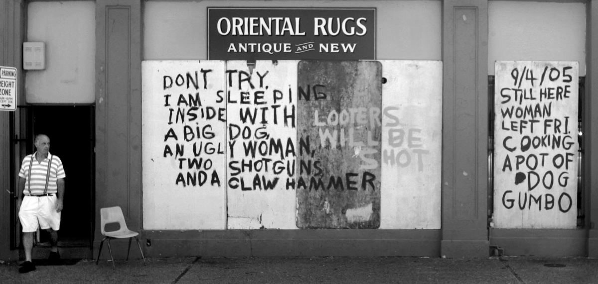 Award of Excellence, George S. Smallsreed Photographer of the Year Award - Dale Omori / The Plain DealerA sign warns looters on a storefront near downtown New Orleans Sept. 7, 2005.  