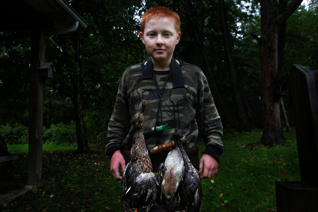 Award of Excellence, George S. Smallsreed Photographer of the Year Award - Dale Omori / The Plain DealerA young duck hunter poses with the ducks he shot on the first day of the special youth duck hunt season.                               