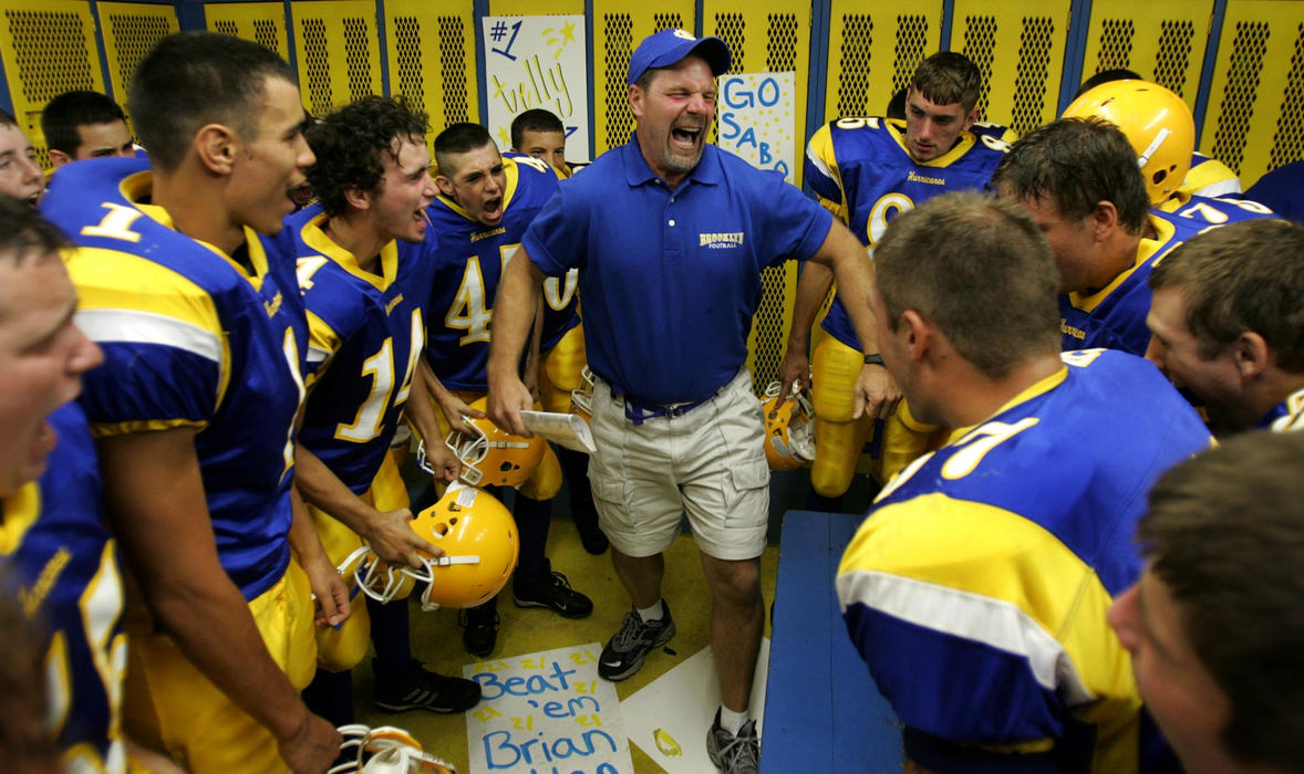 Award of Excellence, George S. Smallsreed Photographer of the Year Award - Dale Omori / The Plain DealerBrooklyn High School assistant coach John Hribar gets his team fired up before their opening game against Rhodes High School.  The year before the team was winless.