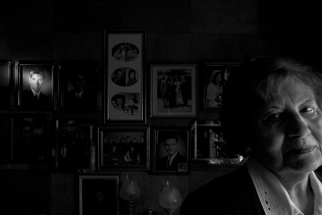 First place, George S. Smallsreed Photographer of the Year Award - Mike Levy / The Plain DealerGita Frankel, holocaust survivor surrounded by family photos at her home.