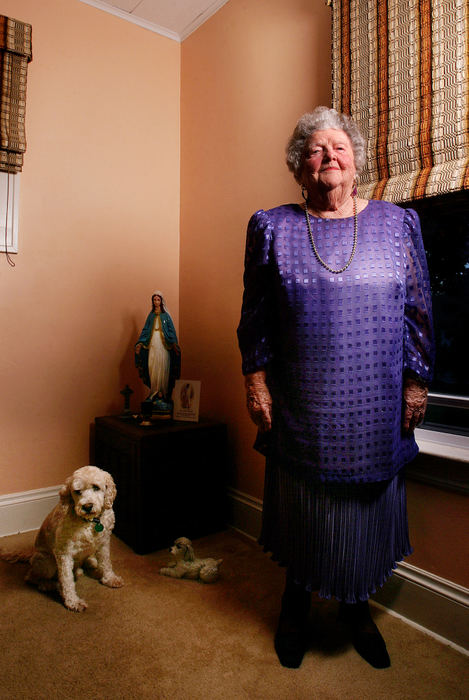 First place, George S. Smallsreed Photographer of the Year Award - Mike Levy / The Plain DealerColletta Masterson Jablonski, 90-year-old matriarch and "grand old dame" of the west side Irish community poses with her dog, Benji.  