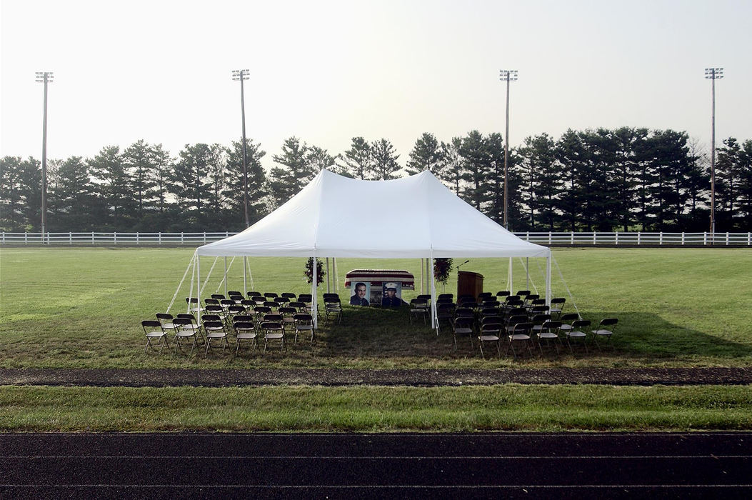 Second Place, George S. Smallsreed Photographer of the Year Award - Greg Ruffing / FreelanceThe football field at East Clinton High School prior to funeral services for Lance Cpl. Brett Wightman in Sabina, Ohio. Wightman, a former prom king and football team captain at the high school, was one of 20 Ohio-based Marines from the 3rd Battalion, 25th Regiment killed in the Iraq war in August. By the end of 2005, total U.S. casualties in the war had surpassed 2,100.