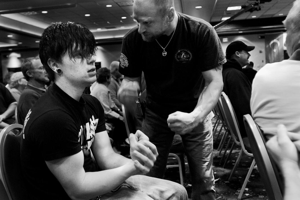 Second Place, George S. Smallsreed Photographer of the Year Award - Greg Ruffing / FreelanceWillie tries to get Boomer psyched up, as the son's matches came up first. "This is it Boomer, it all comes down to this day," Willie says. "You're one year smarter and one year stronger." Boomer would compete to defend the world championship gold medal he won in 2004 in the amateur division of the 154-pound right-hand class.