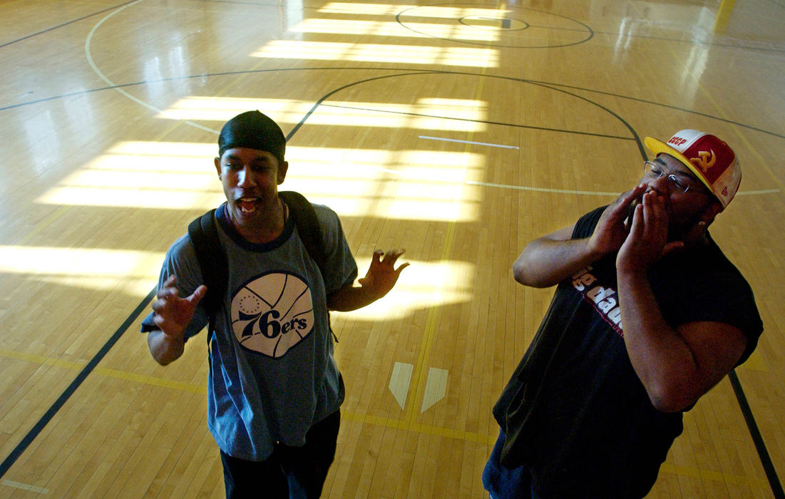 Third Place, Student Photographer of the Year Award - Michael P. King / Ohio UniversityBrian Smith II (left) who plays "Johnny Bones" and Devin Wilsonwho plays "Daddy Stax," freestyle during a break in rehearsal at Lincoln Elementary, April 5, 2005. Freestyling is defined as "rapping that is done in the moment at pure free flow, with no previously composed lyrics, and reflecting a direct mapping of the mental state and performing situation of the artist. It is similar to improvisational music or acting."