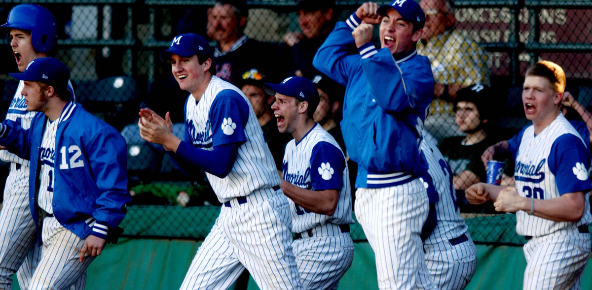 Third Place, Student Photographer of the Year Award - Michael P. King / Ohio UniversityThe Memorial High School baseball team bench celebrates its last inning win over Moline High School at Bosse Feld in Evansville, Ind., March 31, 2005.