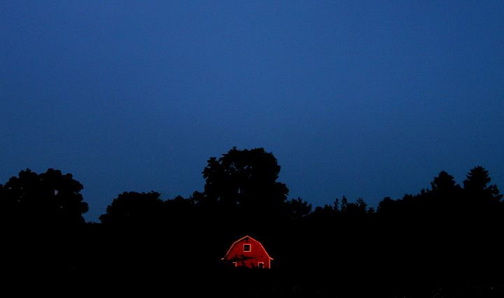 Third Place, Pictorial - Phil Masturzo / Akron Beacon JournalThe lighting in the storm aftermath casts a spectacular glow on a barn along State Route 303 in Hudson. 
