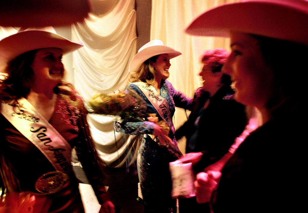 Third Place, Photographer of the Year - Greg Ruffing / FreelanceFamily members, contestants and pageant organizers gather to congratulate Joanna Blackwell (center) of Center, Texas, after she was crowned the new Miss Rodeo Texas at the final Coronation in San Antonio. Miss Blackwell will now go on to represent Texas in the Miss Rodeo America Pageant in Las Vegas, as well as tour the country doing promotional appearances.