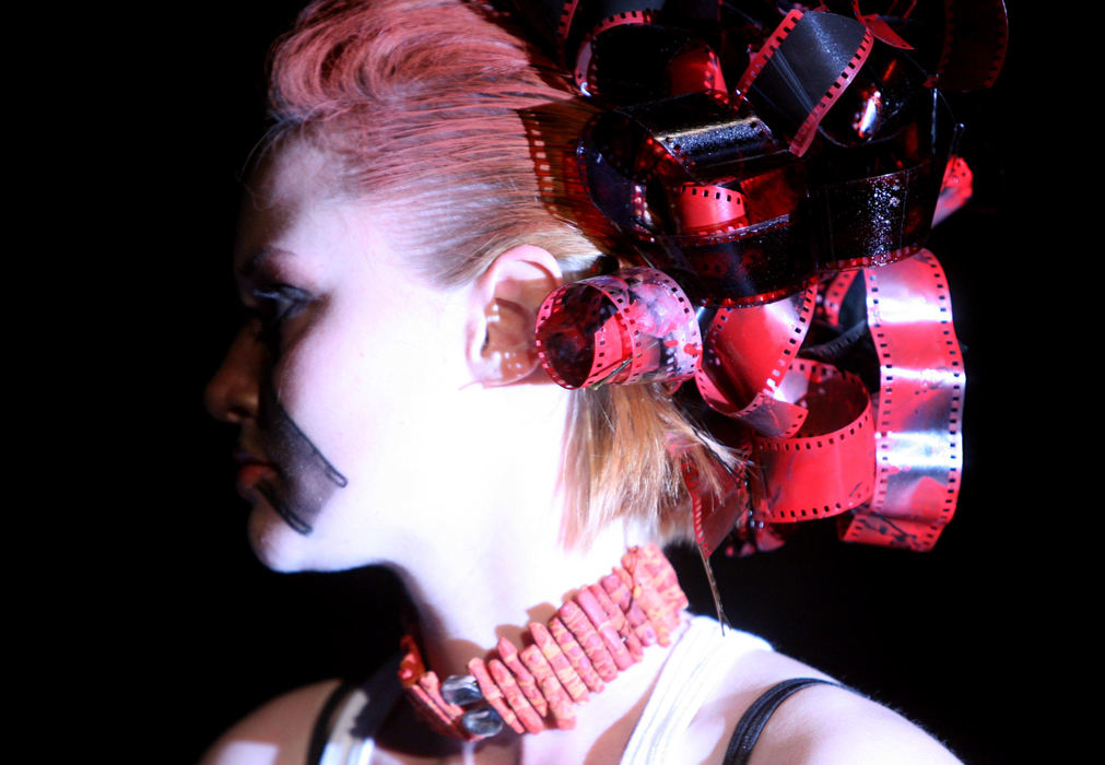 Award of Excellence, Photographer of the Year - Dale Omori / The Plain Dealer A model wears film in her hair during show of mixed media at Cleveland Public Theater.