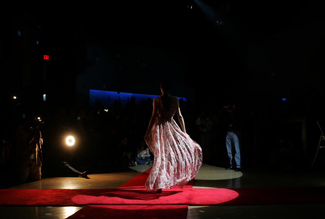 Award of Excellence, Photographer of the Year - Dale Omori / The Plain DealerA model walks the runway during the Latino show at Club Moda during Fashion Week.                               