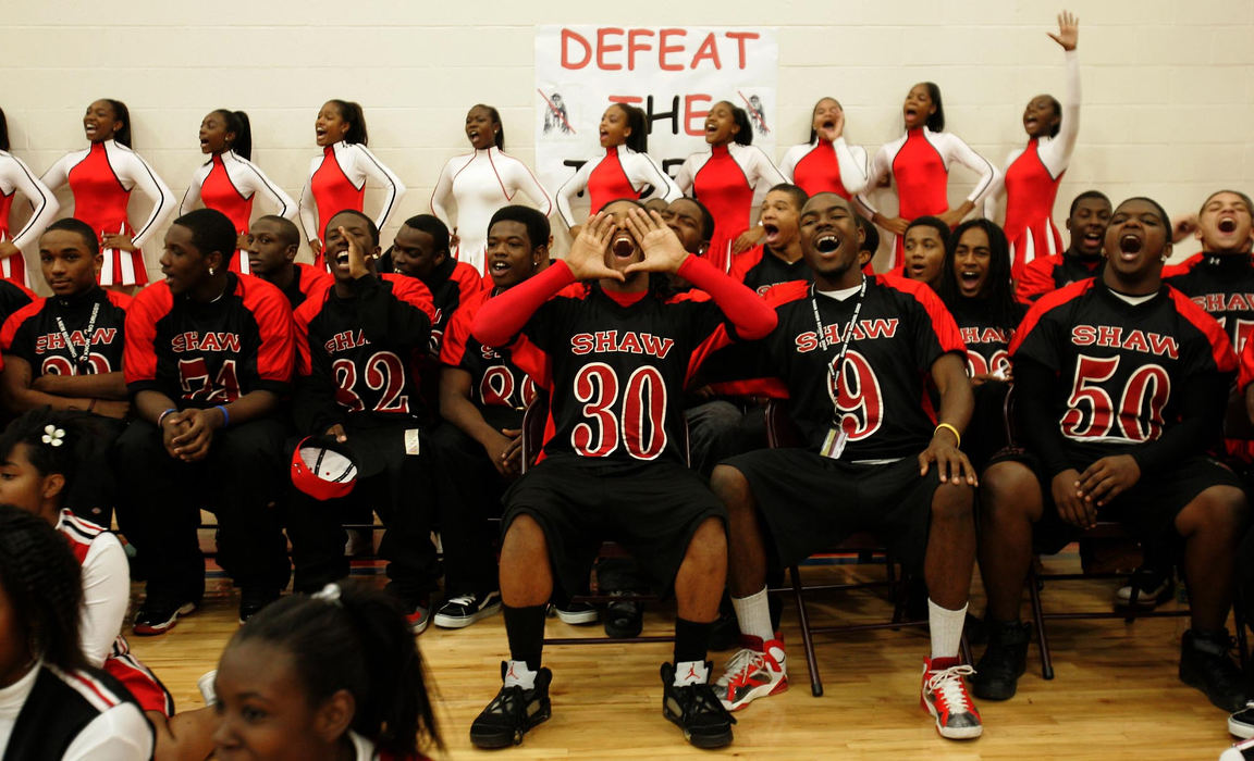 Award of Excellence, Photographer of the Year - Dale Omori / The Plain DealerDominic Cunningham (30) and other members of the Shaw High School football team show their spirit during pep rally Oct. 28, 2006, East Cleveland. 
