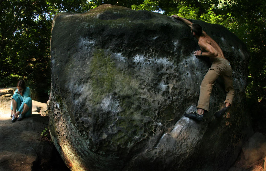 Award of Excellence, Photographer of the Year - Dale Omori / The Plain DealerClimbers warm up by climbing smaller rocks, an activity they call "bouldering."                               