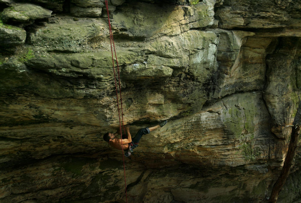 Award of Excellence, Photographer of the Year - Dale Omori / The Plain DealerA climber reaches a critical point beneath a ledge in the climb at Whipps Ledges in Hinckley Reservation.                               