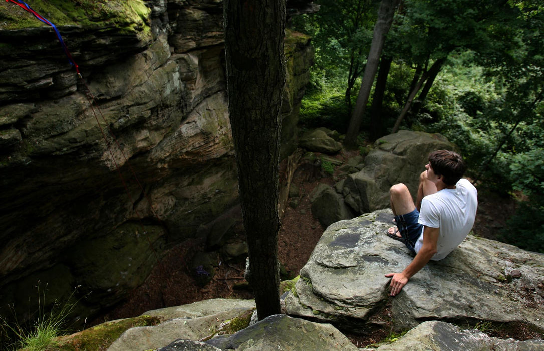 Award of Excellence, Photographer of the Year - Dale Omori / The Plain DealerA spectator checks out the view atop Whipps Ledges in Hinckley Reservation.                               