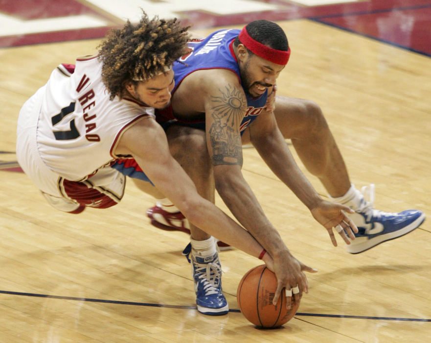 First Place, Photographer of the Year - John Kuntz / The Plain DealerAnderson Varejao of the Cleveland Cavaliers and Detroits' Rasheed Wallace fight for a loose ball in the 4th quarter May 19, 2006 at Quicken Loans Arena. 