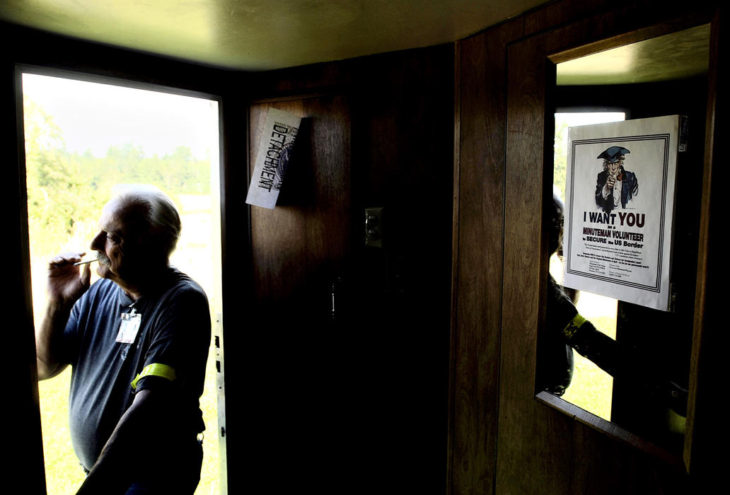 Third Place, Photographer of the Year - Greg Ruffing / FreelanceAt the headquarters of the Washington state detachment of the Minutemen Civil Defense Corps near Ferndale, Washington. The Minutemen, more widely know for their activity along the U.S.-Mexico border, have set up eight patrol posts along the U.S.-Canada border in Washington between Blaine and Sumas.