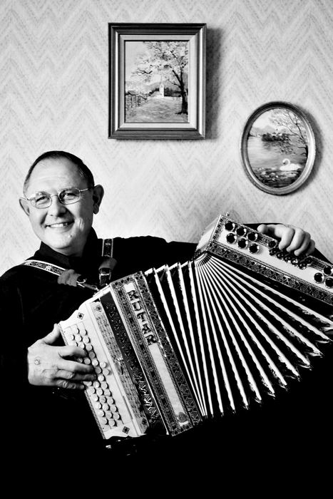 Third Place, Photographer of the Year - Greg Ruffing / FreelanceJoe Cermelj of Broadview Heights began playing only a few months ago, after finding his father's old button box.