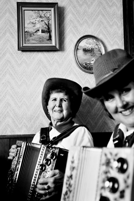 Third Place, Photographer of the Year - Greg Ruffing / FreelanceFran Prijatel (left) of Wickliffe and her daughter Joanne Bowman of Willoughby. The mother-daughter team are members of the polka band Buttonaires.