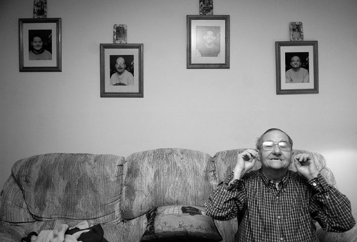 Award of Excellence, Portrait/Personality - David Foster / Kent State University69-year-old Walter Carkauff is the oldest and highest functioning member of the Mary Thomas Community group home in New Franklin. Walter has spent the last 17 years with the other three mentally handicapped men, pictured on the wall. 