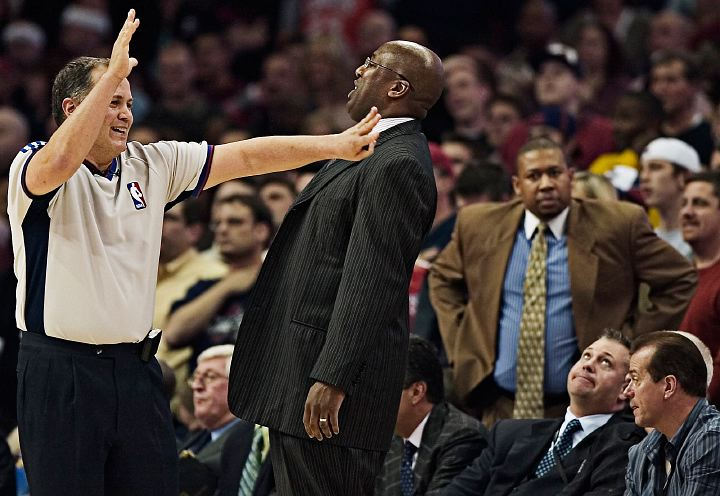 Award of Excellence, Sports Feature - Andrew Dolph / Medina GazetteNBA Official Mark Wunderlich charges Cleveland's Eric Snow for pushing the Knicks' Jamal Crawford while he attempted to make a lay-up. The Cavaliers' head coach Mike Brown (middle), assistant coaches Melvin Hunt (right) and Michael Malone (bottom) respond to Crawford's reaction to the call (out of frame).
