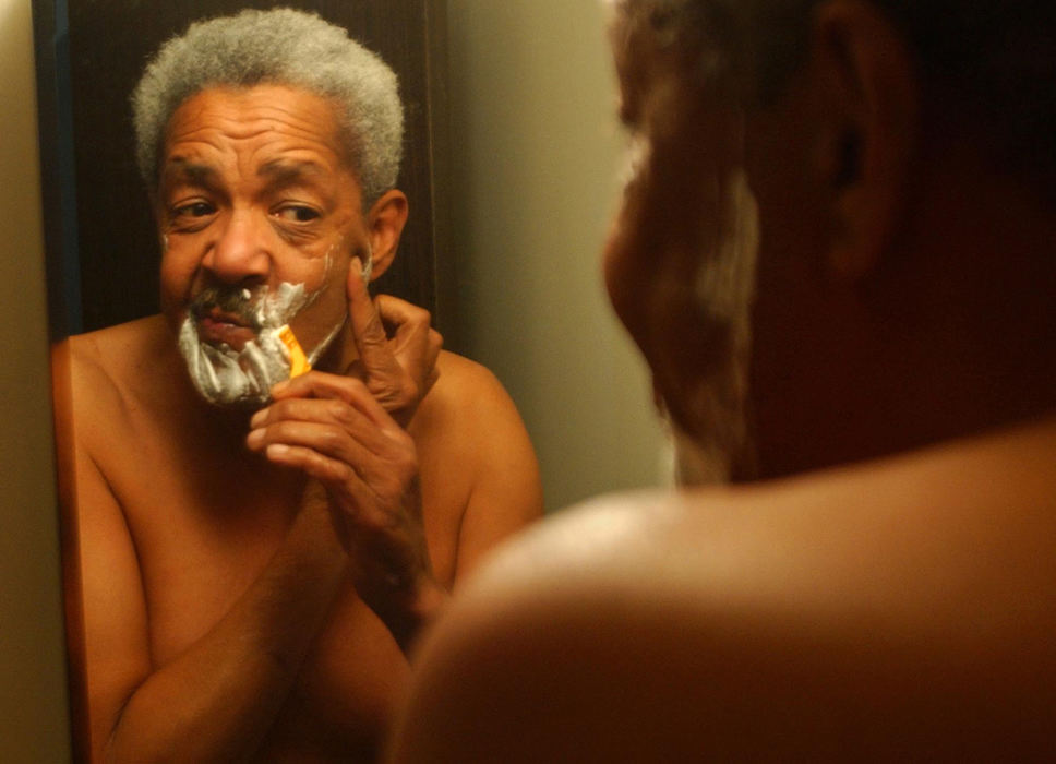 First Place, Student Photographer of the Year - David Foster / Kent State UniversityGlen shaves before taking a 30 minute bus ride to Ravenna to file for disability at the Veterans Service Office. 