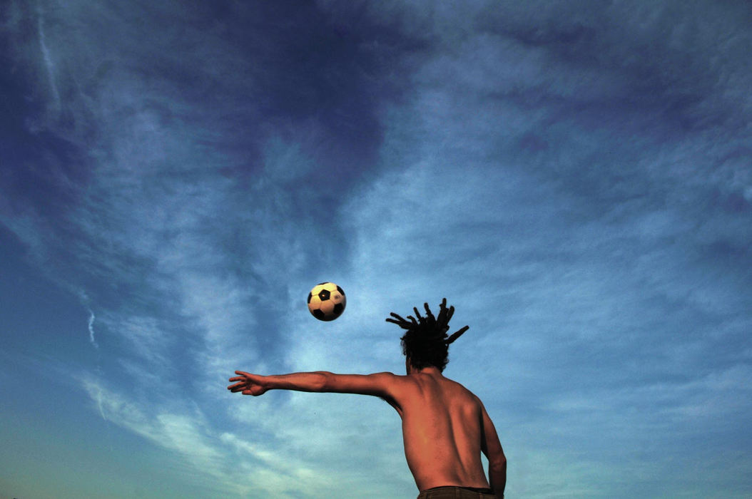First Place, Student Photographer of the Year - David Foster / Kent State UniversityA man plays juggles a soccer ball at a campground in Manchester, Tenn..