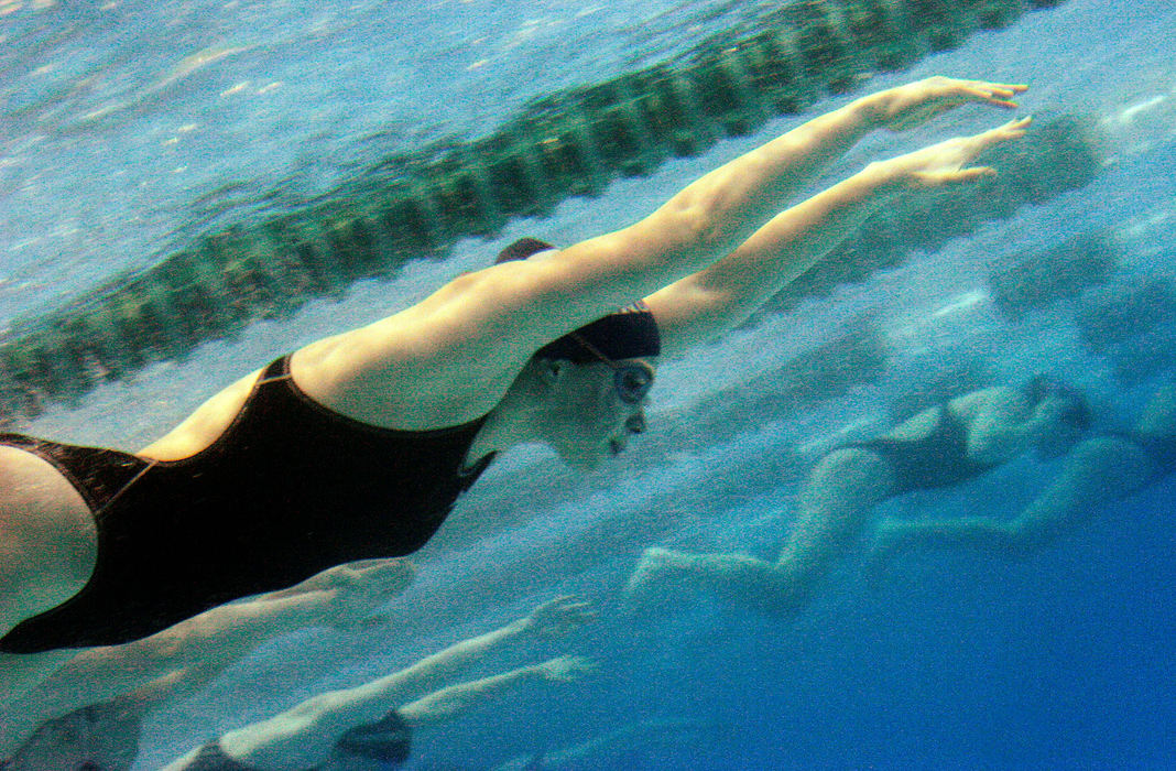 Second Place, Student Photographer of the Year - Michael P. King / Ohio UniversityJordan Mestemaker of Granville High School, foreground, and other swimmers compete in the final heat of the girls' 100-yard Breaststroke event at the Division II district competition at the Ohio University Aquatic Center in Athens, Feb. 18, 2006.