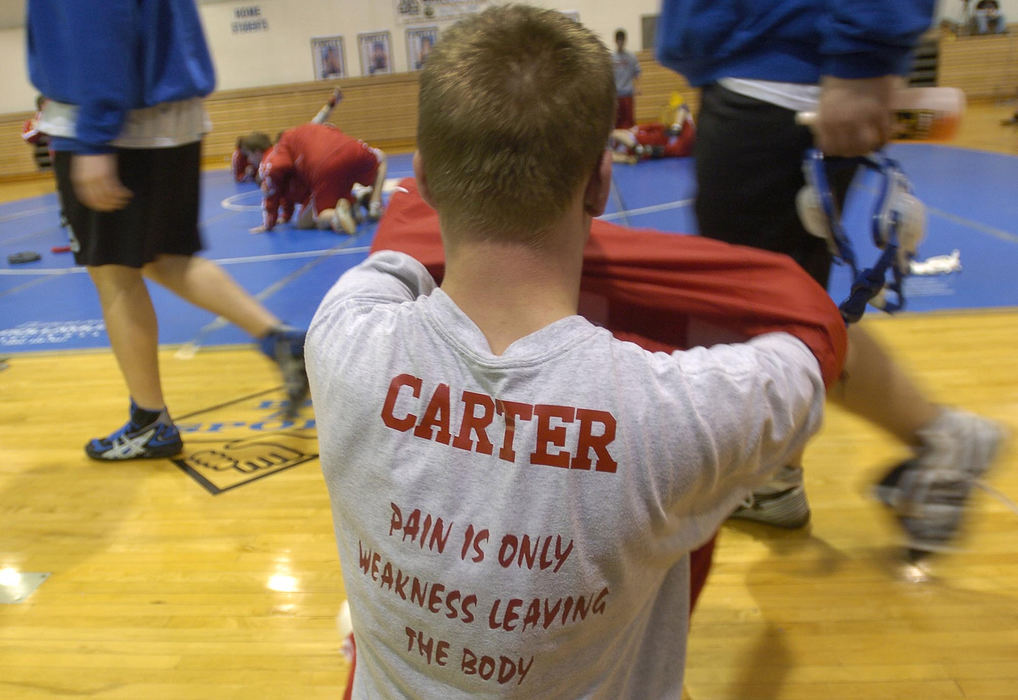 First Place, Sports Picture Story - Jeff Swinger / Cincinnati EnquirerDustin actually lives by the saying on his shirt. Fans from either team can't help but root for this young man during his matches. He lives the spirit.