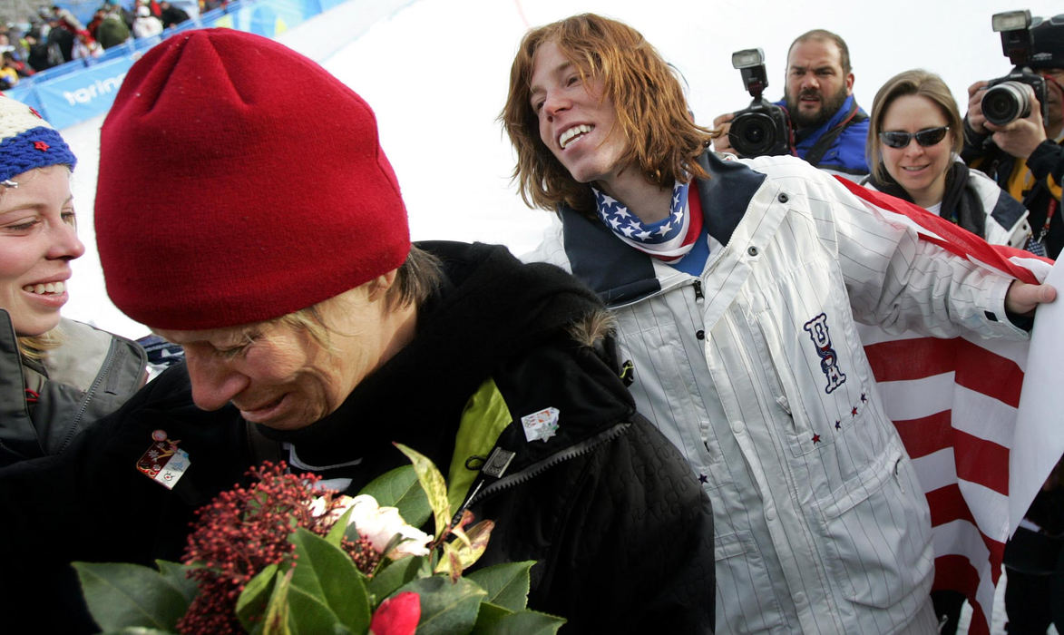 Second Place, Sports Picture Story - Joshua Gunter / The Plain DealerCathy White, Shaun White's mom, cries after Shaun gives her his bouquet from the awards ceremony at the snowboard halfpipe, February 12, 2006 in Bardonecchia, Italy.  America's White, nicknamed the "Flying Tomato" for his hair, won the gold in the halfpipe at the Torino Olympic games. 