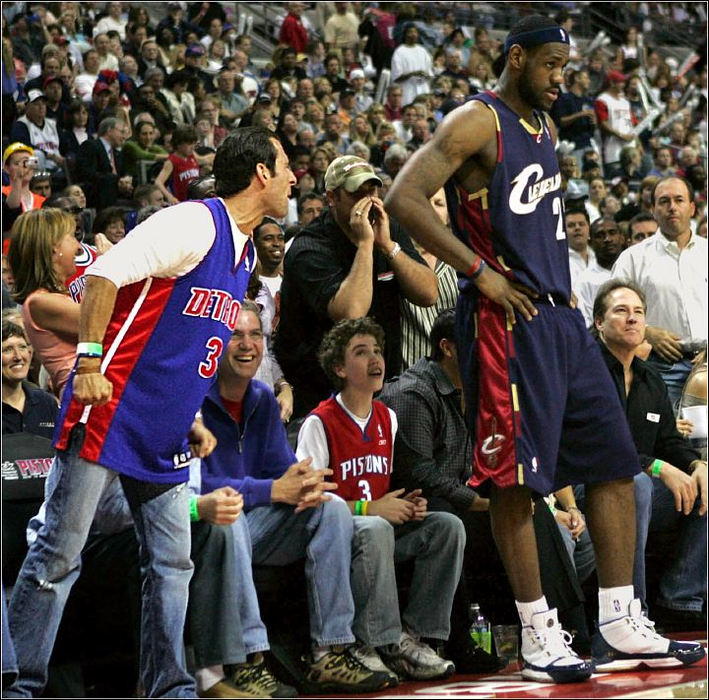 Third Place, Sports Picture Story - Ed Suba, Jr. / Akron Beacon JournalCleveland Cavalier forward LeBron James ignores the taunts of several Detroit fans while waiting to inbound the ball during second-half action during Game 7 of the semifinals of the Eastern Conference playoffs at Quicken Loans Arena on May 21, 2006, in Auburn Hills, Michigan. 