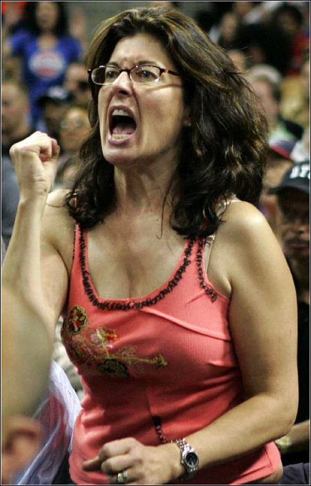 Third Place, Sports Picture Story - Ed Suba, Jr. / Akron Beacon JournalCleveland Cavaliers fan Julie Kroll, part of a large group of fans who traveled from Ohio to support the team, cheers for the team during first-half action in Game 7 of the semifinals of the Eastern Conference playoffs against the Detroit Pistons at the Palace in Auburn Hills on May 17, 2006, in Auburn Hills, Michigan. 