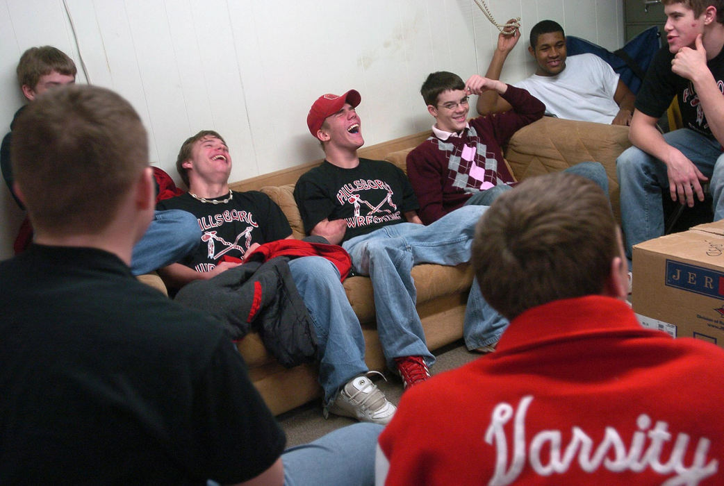 First Place, Sports Picture Story - Jeff Swinger / Cincinnati EnquirerDustin hangs out having a good time with his teammates before their trip to Amelia High School for a match.