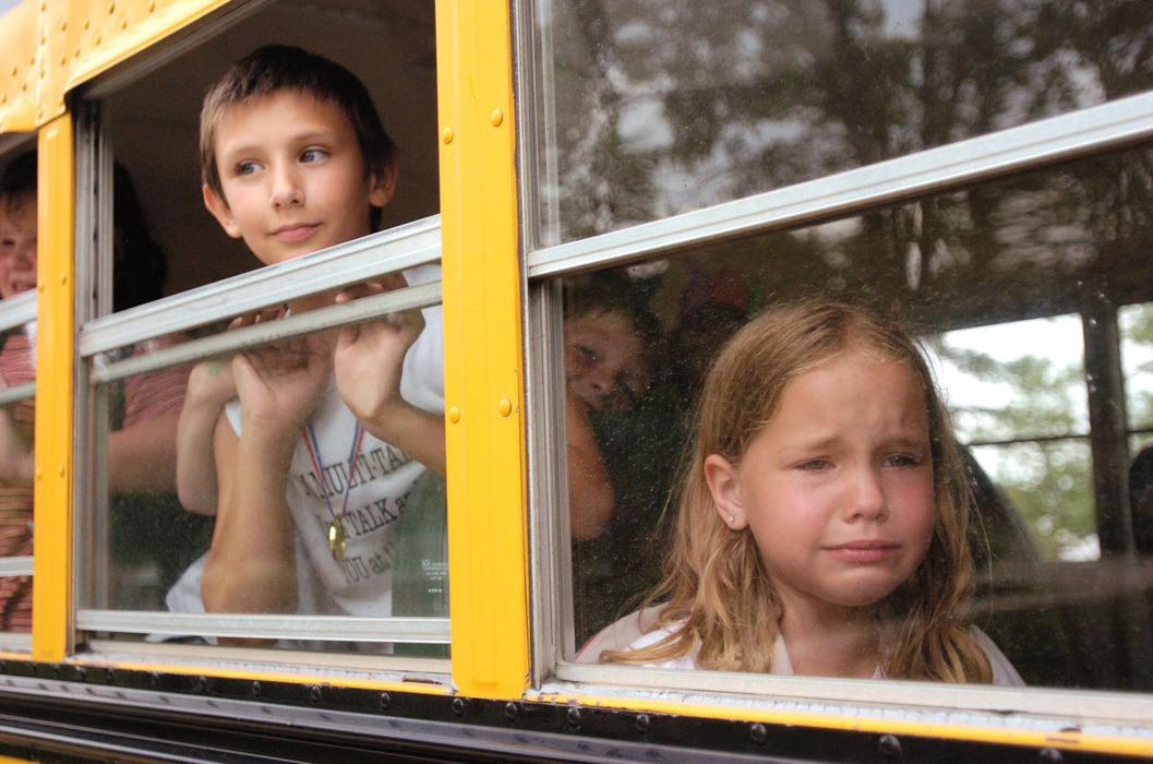 First Place, Enterprise Feature - Randy Roberts / The CourierFirst grade student Desiree McFadden gets a little emotional as she leaves Northview Primary School on the last day of the school year. She said she was going to miss her teacher Valerie Smith.