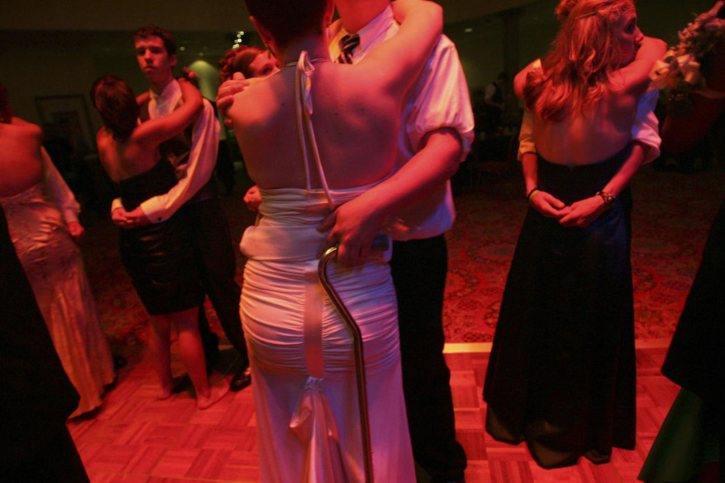 Third Place, Feature Picture Story - Shari Lewis / The Columbus DispatchAfter two operations and months of therapy, she was able to dance at her senior prom with her date, Luke Sheldon. Luke, a longtime friend of Rachel's, held her cane.
