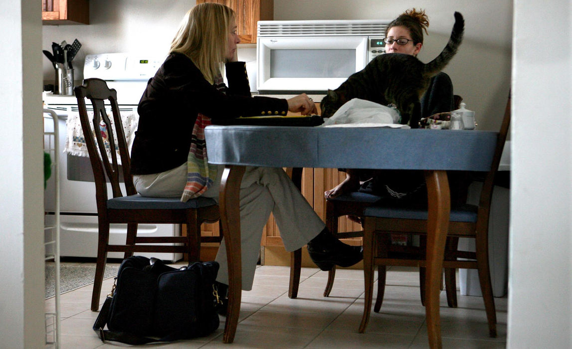 Award of Excellence, Feature Picture Story - Chris Stephens / The Plain DealerVisiting nurse Sue Johnson counsels Bridget, a mental health client, in Bridget's suburban home.  Bridget was hospitalized soon after this visit after relapsing into drug abuse. 