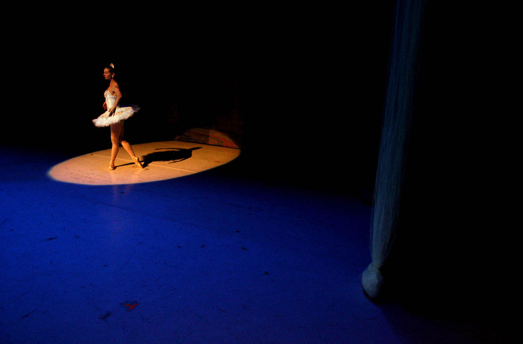 Award of Excellence, Feature Picture Story - Lisa DeJong / The Plain Dealer Janet Strukely, 24, dances the part of the Sugar Plum Fairy during dress rehearsal for the Nutcracker.