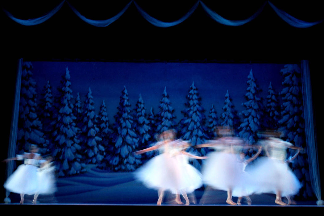 Award of Excellence, Feature Picture Story - Lisa DeJong / The Plain DealerBallerinas float across the stage during the snow scene at dress rehearsal for the Nutcracker.