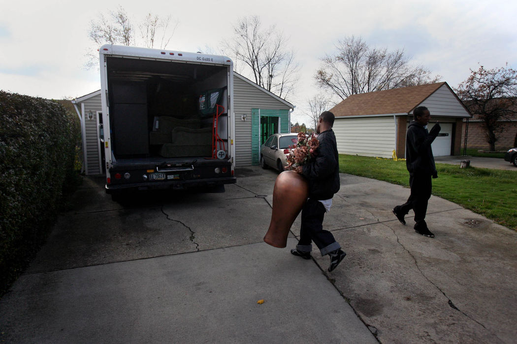 First Place, News Picture Story - Gus Chan / The Plain DealerThe U-Haul truck is loaded with Darnellas Caldwell's belongings to be moved into storage.
