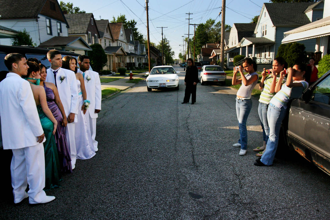 First Place, James R. Gordon Ohio Understanding Award - Gus Chan / The Plain DealerThe limousine stopped many times on the near westside to have the prom goers photographed.  