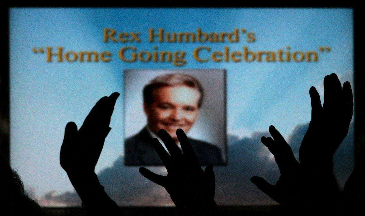 Award of Excellence, Photographer of the Year - Ken Love / Akron Beacon JournalWorshipers raise their hands in praise during a memorial service for televangelist Rex Humbard, 88.
