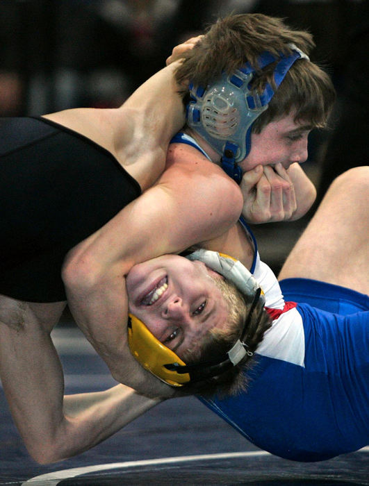 Award of Excellence, Photographer of the Year - Phil Masturzo / Akron Beacon JournalPerry's Joe Brenner is locked up with Lake's Josh Oswald during 119 pound wrestling action on Thursday, Feb 8, 2007 in Hartville.