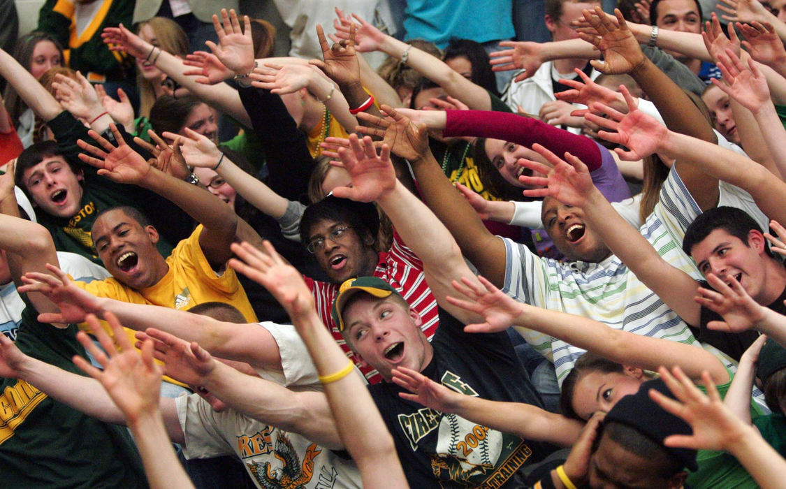 Award of Excellence, Photographer of the Year - Phil Masturzo / Akron Beacon JournalFirestone High School students cheer on their team during a recent basketball game. The Firestone Falcons will take on Cleveland Glenville in the semi-finals. 