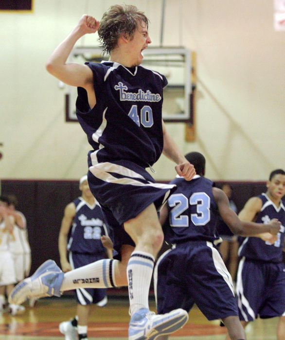 Award of Excellence, Photographer of the Year - Phil Masturzo / Akron Beacon JournalCleveland Benedictine's Dan Reilly celebrates his team's win over Walsh during the Boys District basketball finals at Stow High School in Stow.