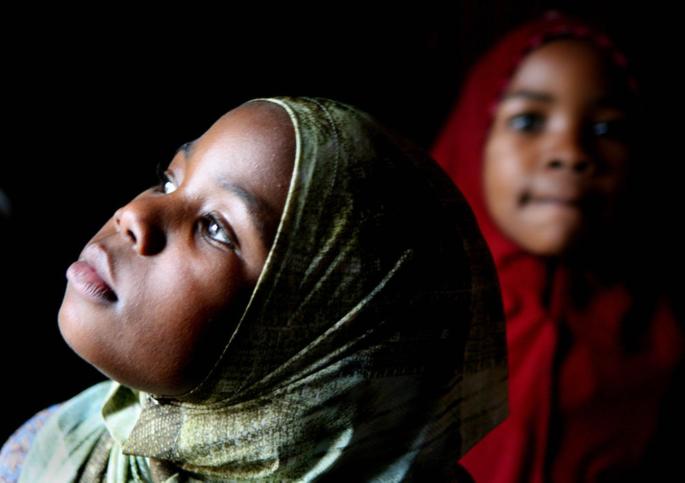 Second Place, Photographer of the Year - Lisa DeJong / The Plain DealerSitey Abukar, 10, and her sister Shamso, 8, belong to one of Cleveland's newest communities. Born in a refugee camp in Kenya, the children arrived in 2004 with about 250 other Somali Bantu to start new lives in a world far unlike the one they knew. 