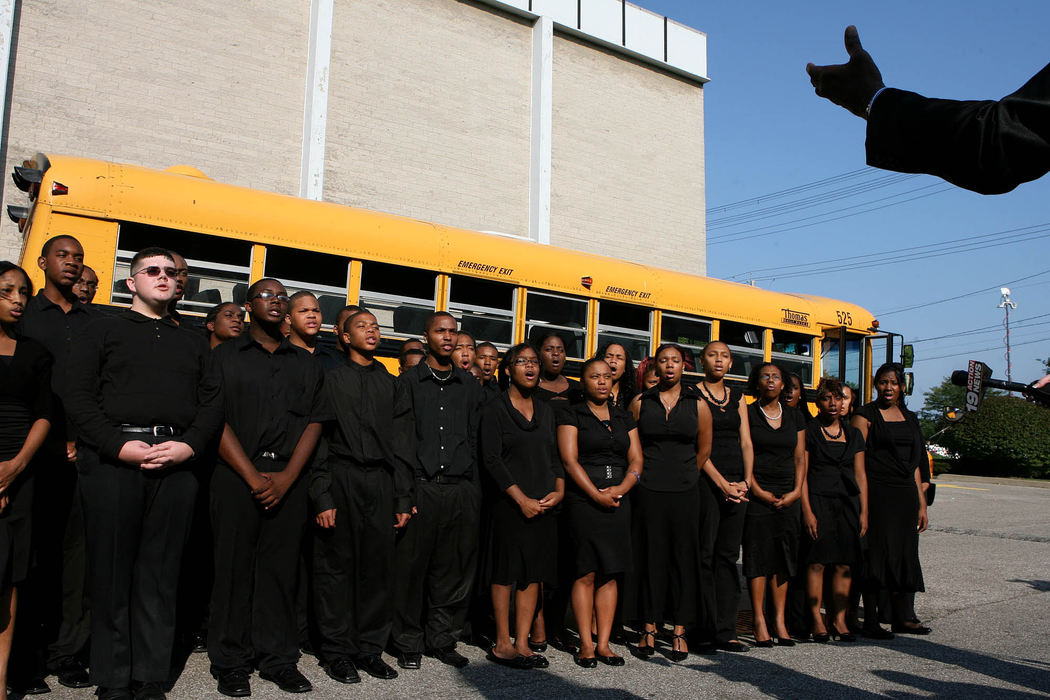 Second Place, Photographer of the Year - Lisa DeJong / The Plain DealerThe high school choir from Cleveland School of the Arts practices singing "Steal Away Home" for the funeral service for Asteve' Thomas, just outside of  Mount Sinai Baptist Church. Thomas was a stand-out student at the school, a poet and a member of this choir.