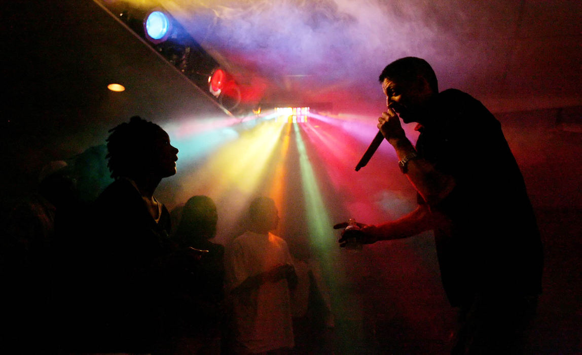 Third Place, Photographer of the Year - Gus Chan / The Plain DealerTerry Knapp, of the Christian hiphop group Life Line, performs at the 4:12,  a Christian night club in Tallmadge.